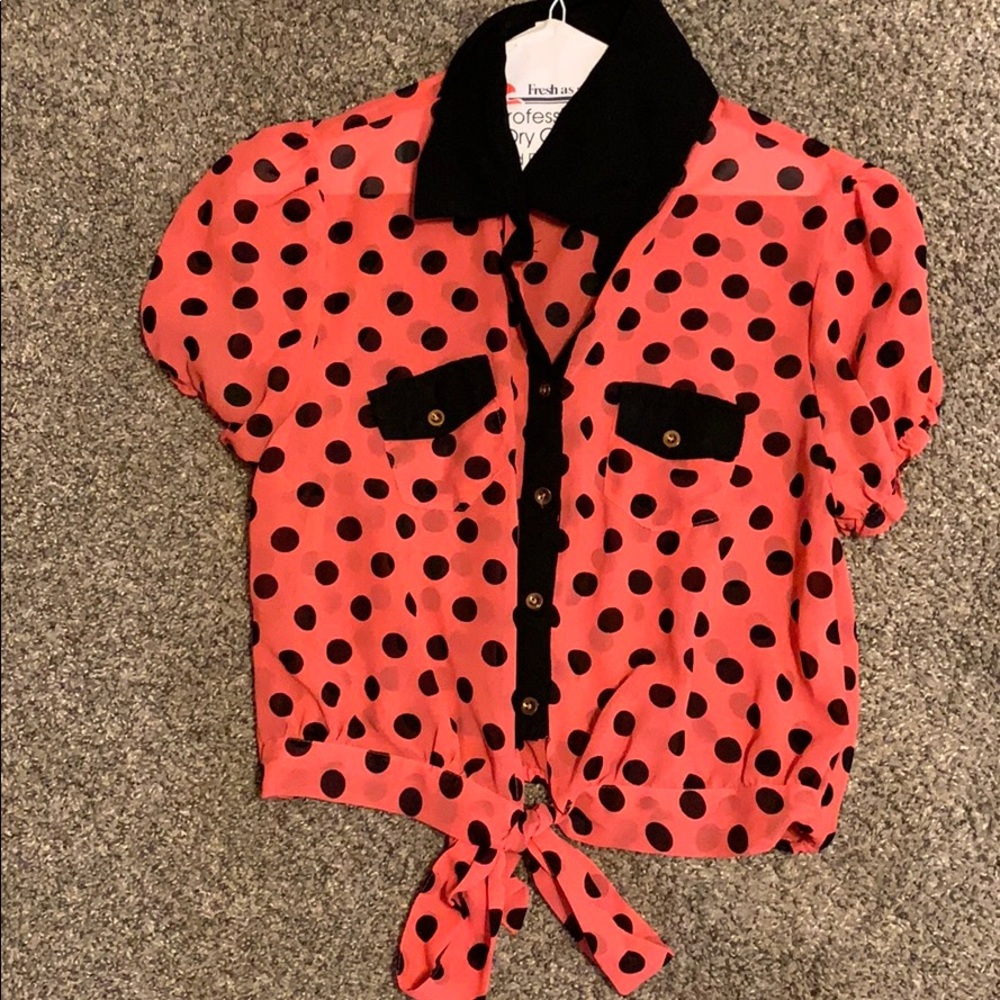 Reddish-orange and black crop top